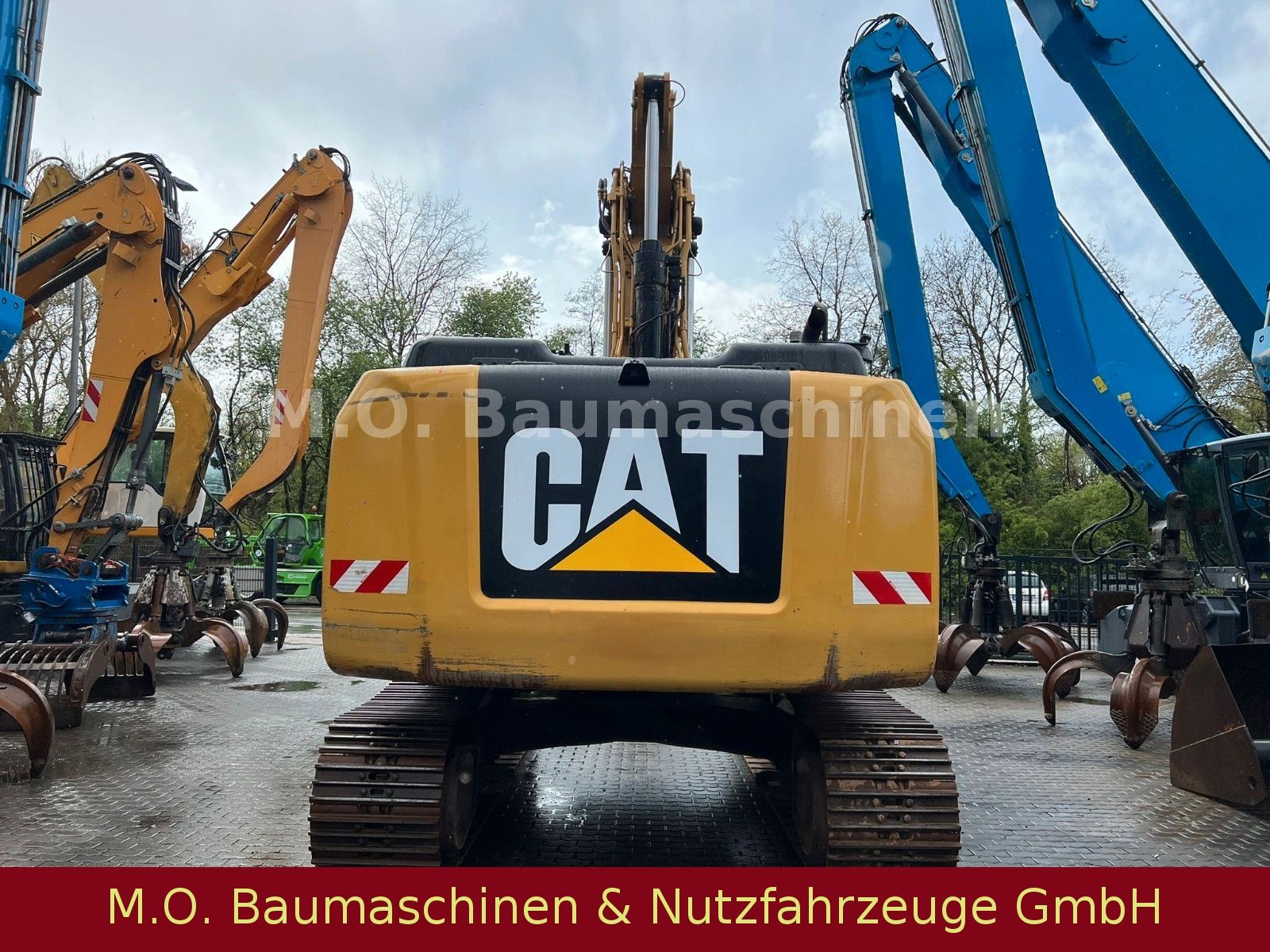 Fahrzeugabbildung CAT 323 EL /Trimble 3 D  VSA / Oilquick OQ 70/55