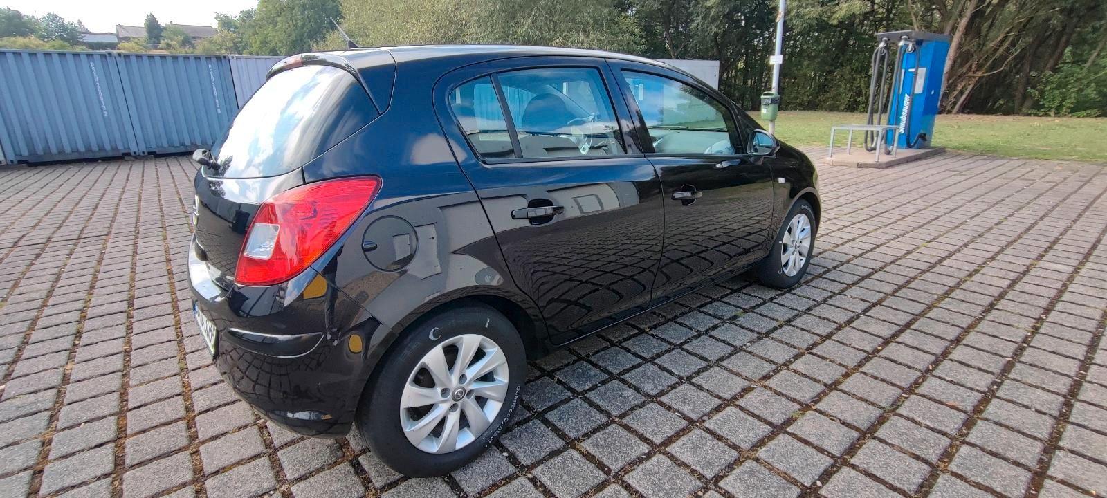 Opel Corsa 2009 — rear view