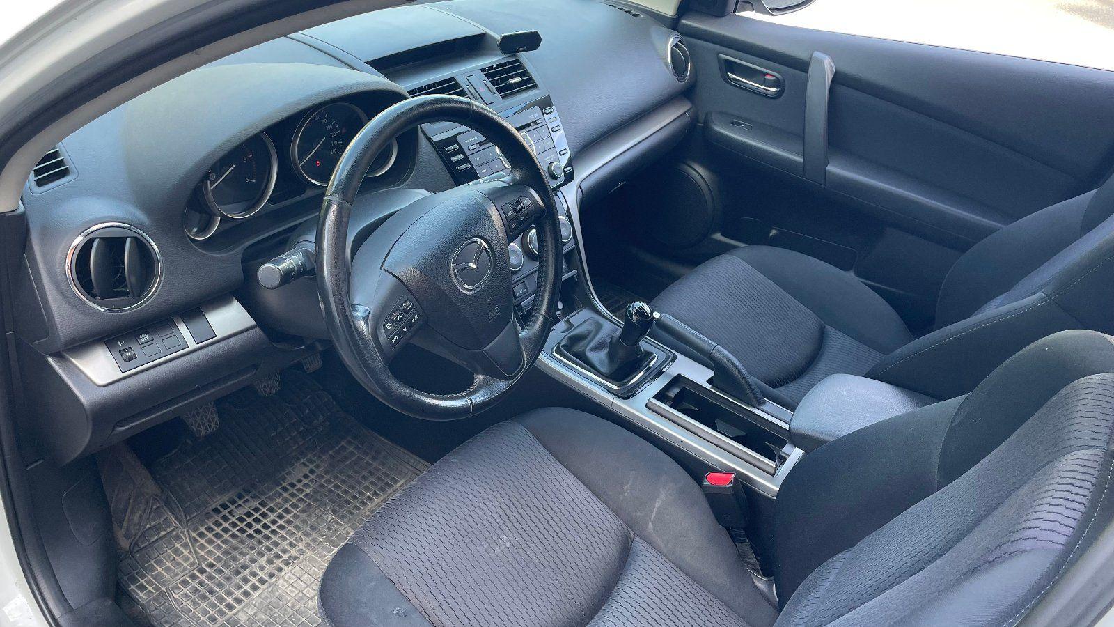 Mazda 2 2011 — photo 7