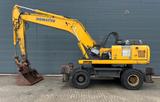 Komatsu PW220 *Bj2010/7000h/Klima/Sw/ZSA/Stützbeine* - Komatsu Mobilbagger Pw