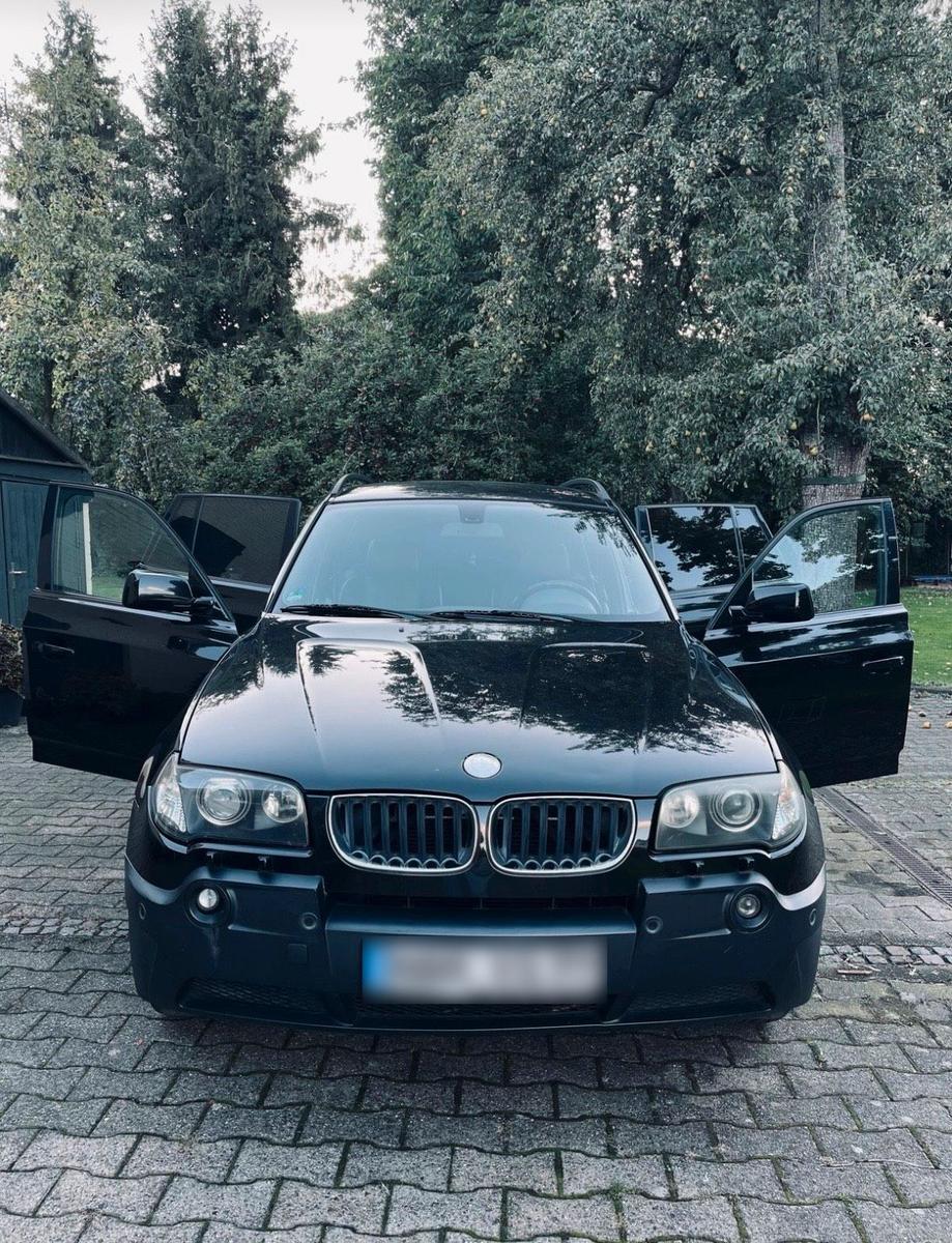 BMW X3 2004 — interior