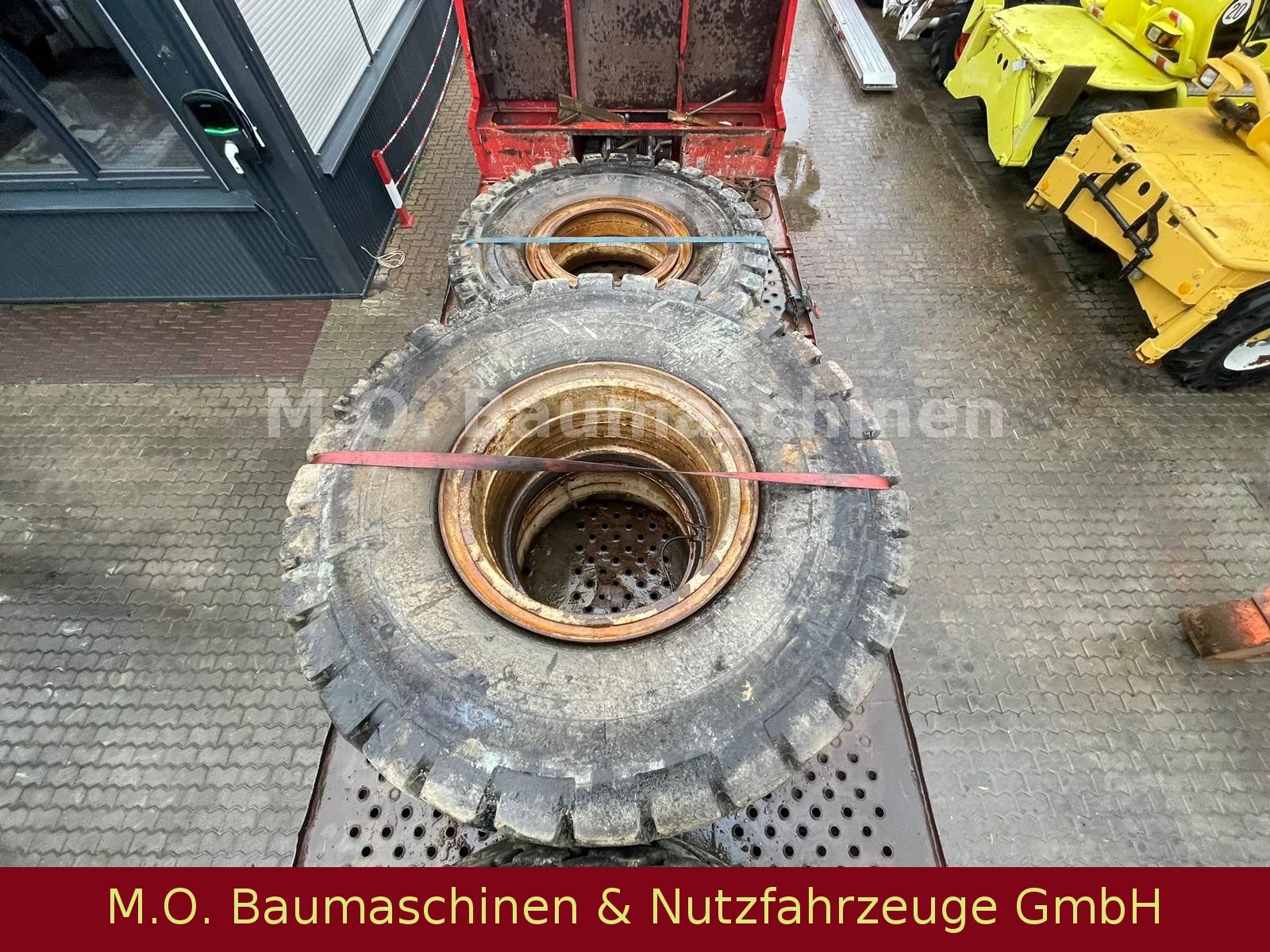 Fahrzeugabbildung CAT 6 x  Reifen / Michellin / Bridgestone /21.00R35/