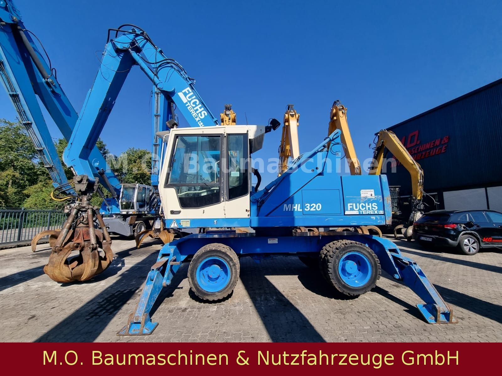 Fahrzeugabbildung Fuchs Terex MHL 320 / Polyp/ Liftkabine