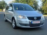 Volkswagen Touran United 1.6 Benziner 7Sitzer - Volkswagen Touran aus 2009: United