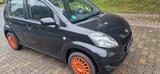 Daihatsu Sirion 1.0 CooLine CooLine - schwarze Daihatsu Sirion