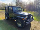 Jeep Wrangler TJ 2.4 Sport, schwarz, gepflegt - Jeep Wrangler: 4.2