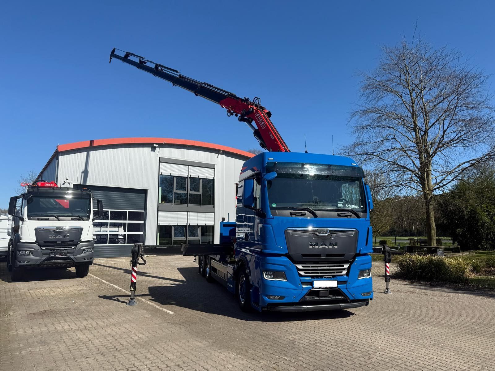 Fahrzeugabbildung MAN TGX 26.640 mit Fassi F365A2.26 Containerpritsche