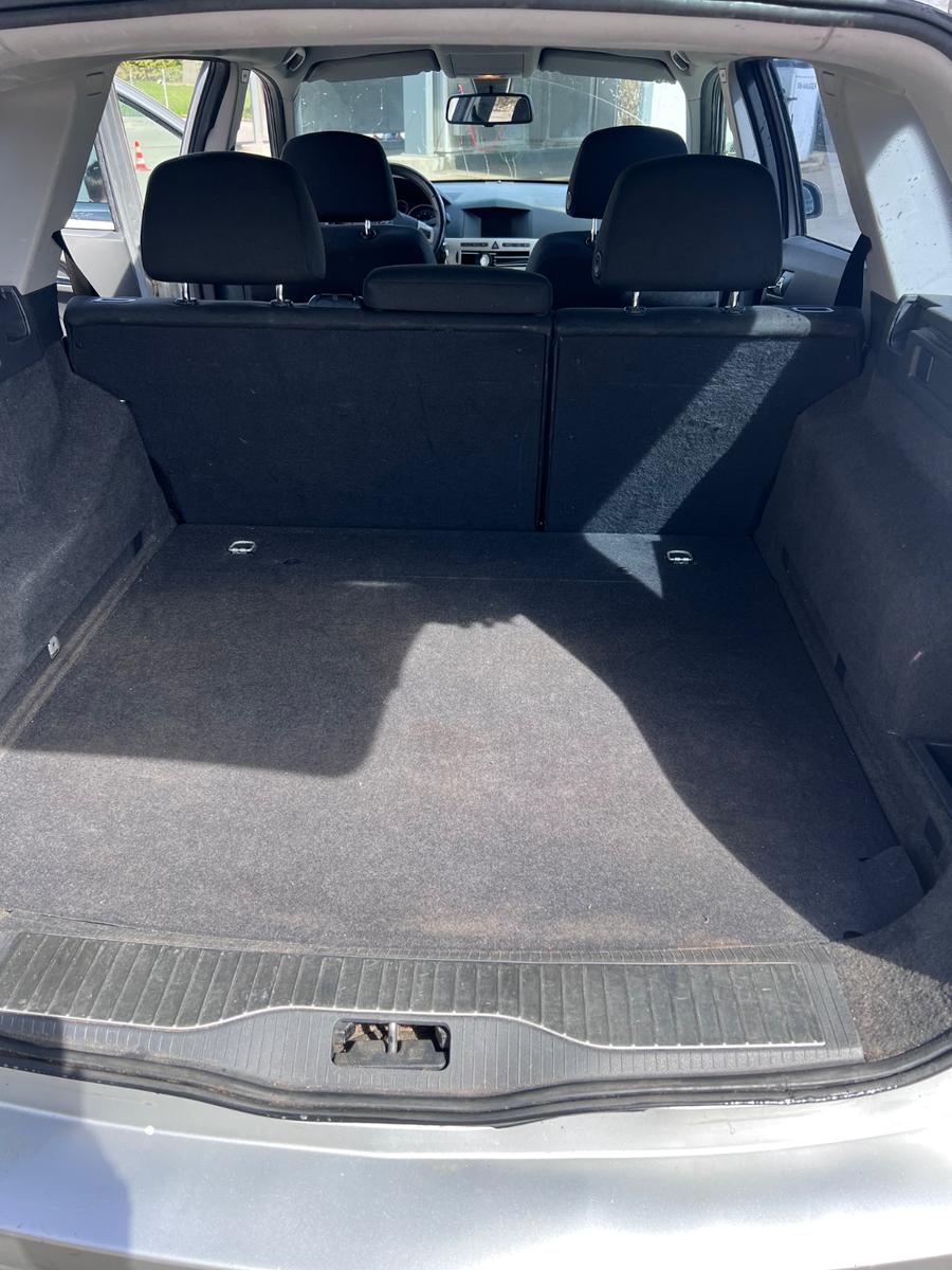 Opel Astra 2008 — photo 13