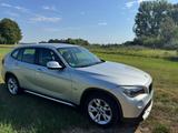 BMW X1 18d 1.Hand,  scheckheft, 8-fach bereift, AHK