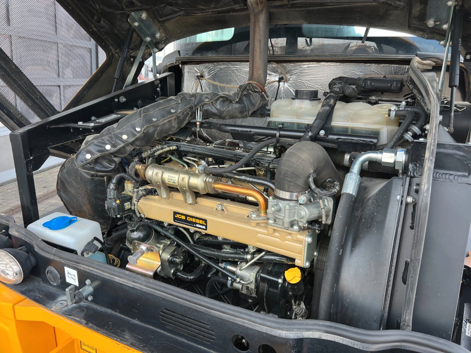 Fahrzeugabbildung JCB 409 SV / nur 2.496h / Klima Klappschaufel Gabel