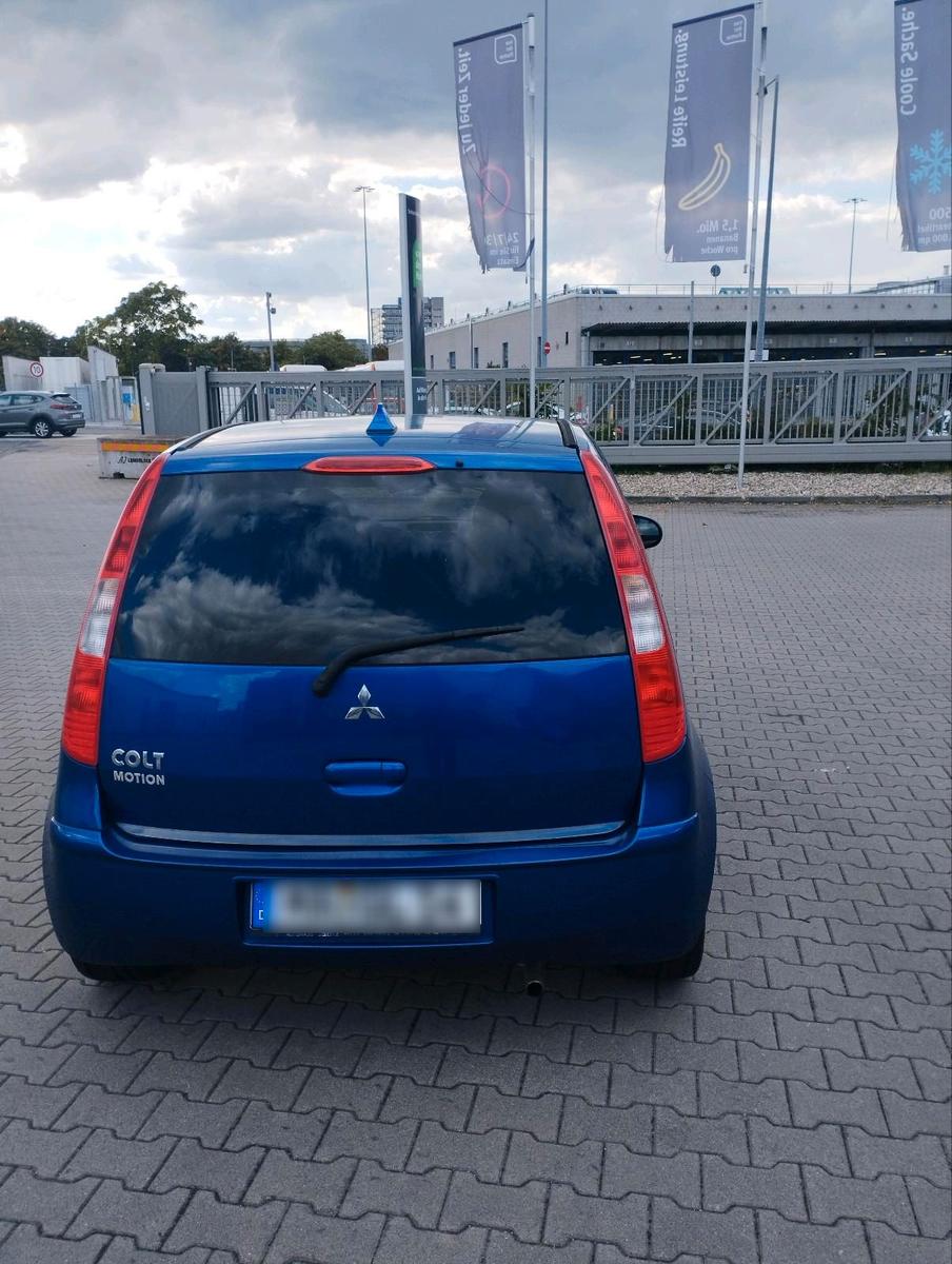 Mitsubishi Colt 2006 — photo 7
