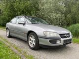 Opel Omega Elegance Lim. 2.0l 110T-Km Tüv=12/2025 AHK - Opel aus 1994