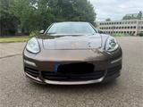 Porsche Panamera - Scheckheft - 4 Punkt Scheinwerfer - Porsche Panamera: Braun