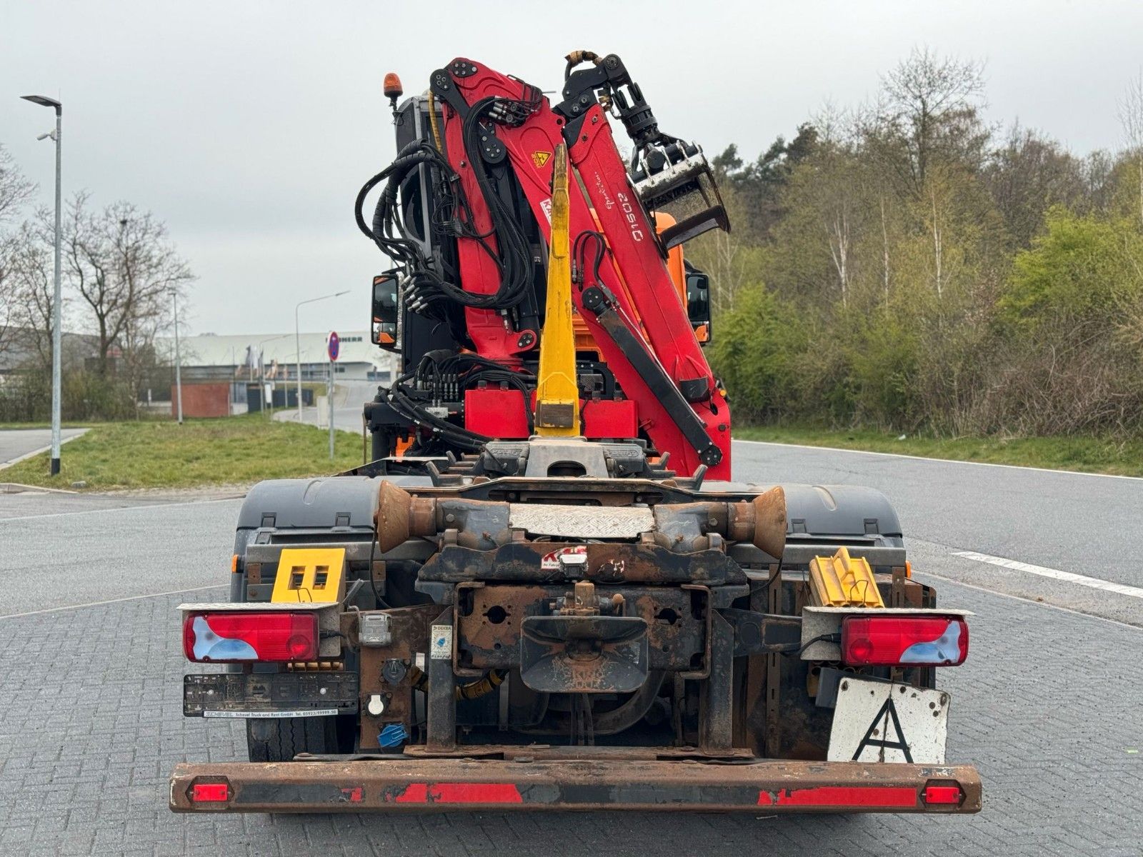 Fahrzeugabbildung MAN TGS 26.440 6x2-4 BL Abrollkipper / Kran