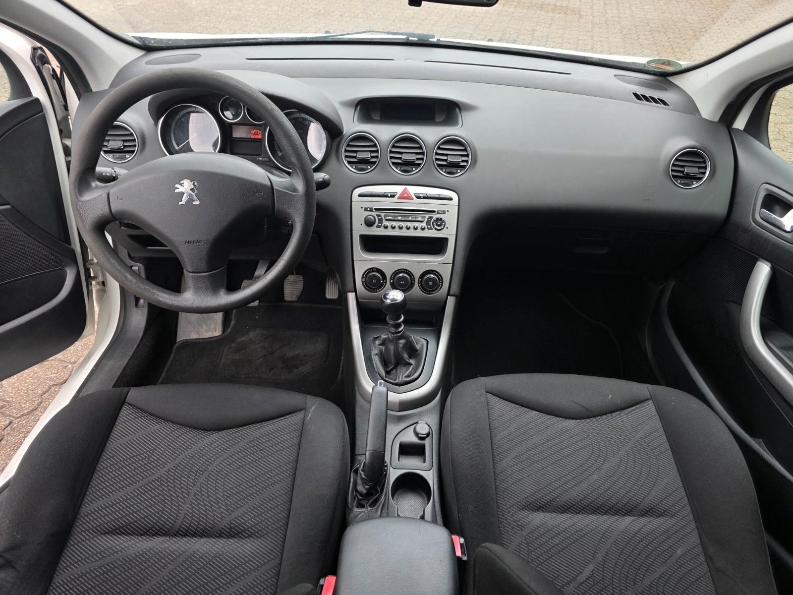 Peugeot 308 2011 — photo 8