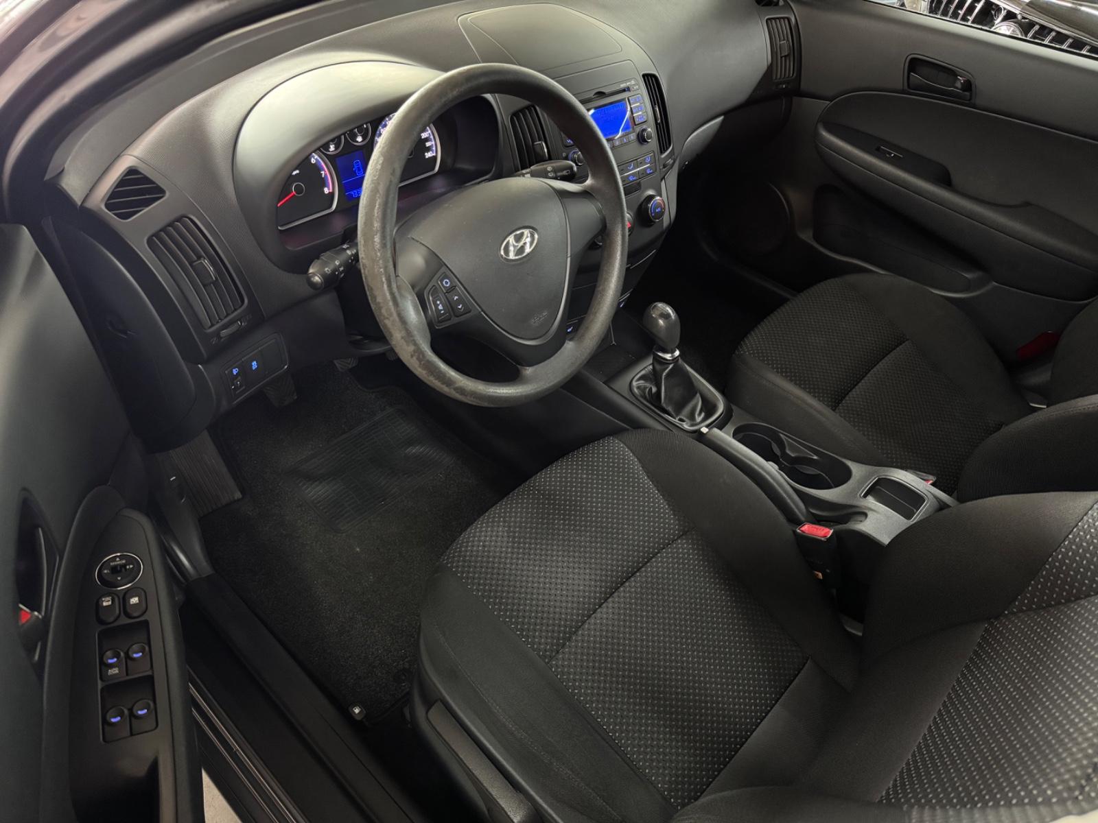 Hyundai i30 2012 — photo 11
