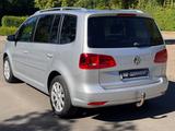 Volkswagen Touran Comfortline 1.4*ALU*PDC*AHK*7 SITZER+ - gebrauchte Kleinbusse in Paderborn