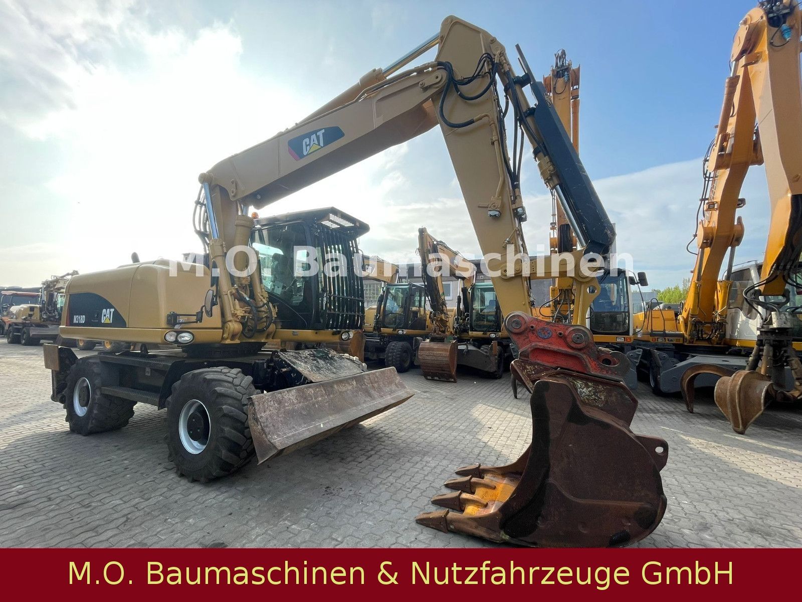 Fahrzeugabbildung CAT M 318 D  / SW /Hammerline + Hammer/ VSA / AC /