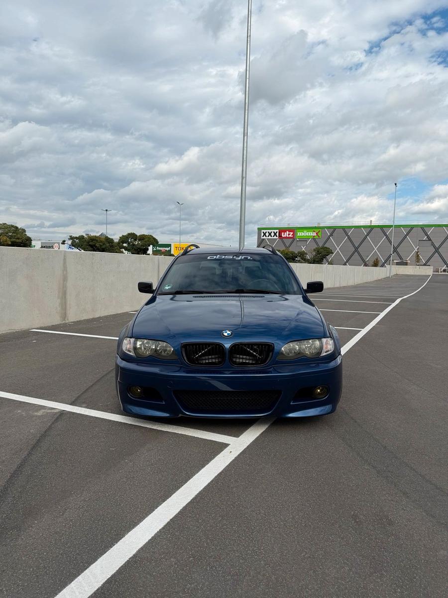 BMW 318 2005 — вигляд ззаду