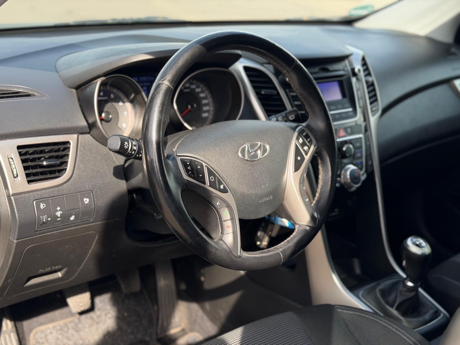 Hyundai i30 2014 — photo 9