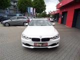 BMW 320 i Touring AUTOMATIK-NAVI-PANORAMADACH-KAMERA - mit Benzin-Antrieb: Kombi, mit Klimaanlage