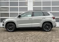 SKODA Karoq 2.0 TSI DSG 4x4 Sportline PANO AHK 5J  GAR bei Autohaus Landmann & Maier OHG