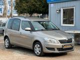 Skoda Roomster 1.2 TSi Ambition Plus*Navi*Temp*PDC - Skoda Roomster mit Benzin-Antrieb