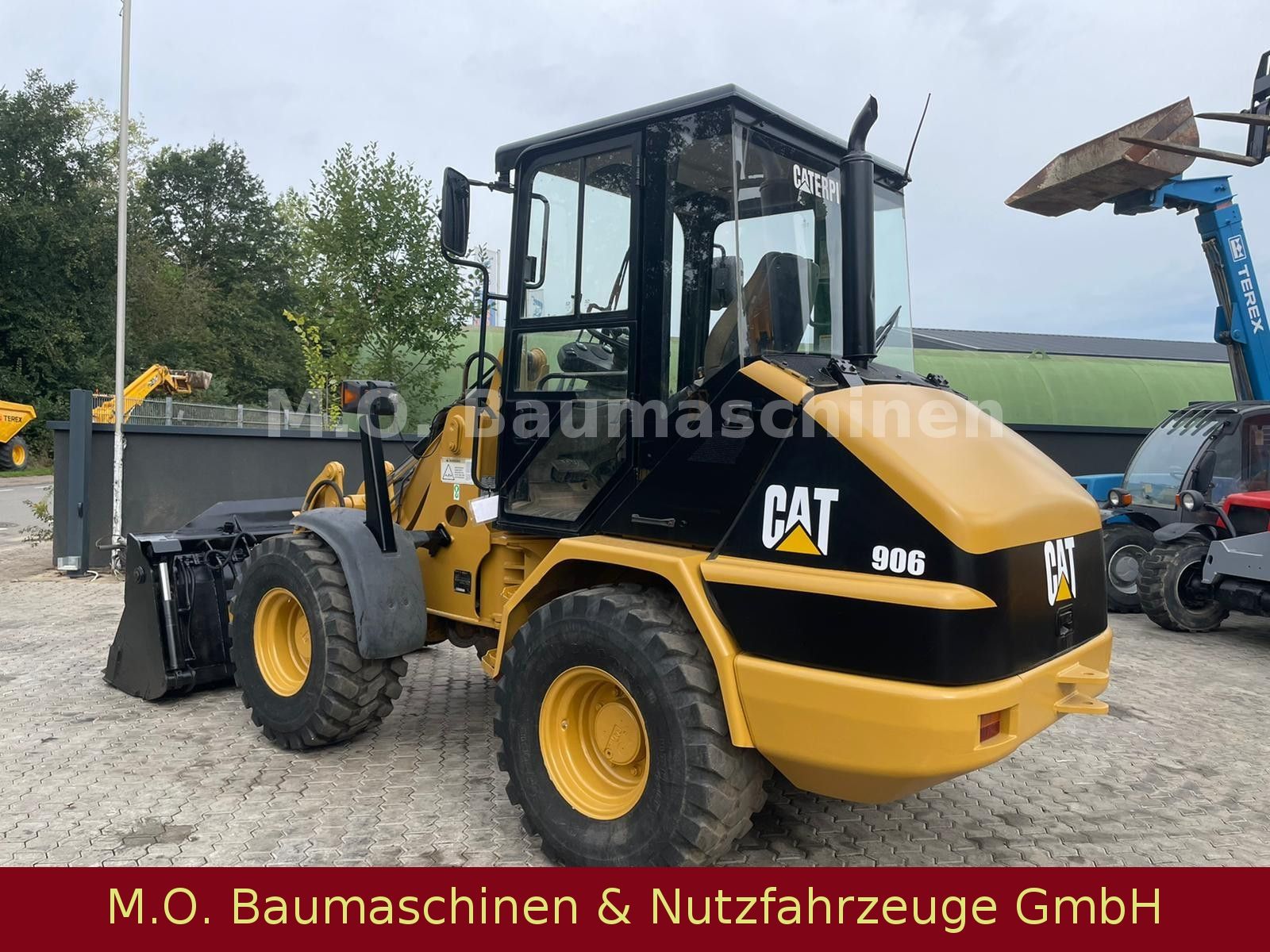 Fahrzeugabbildung CAT 906 / Klappschaufel