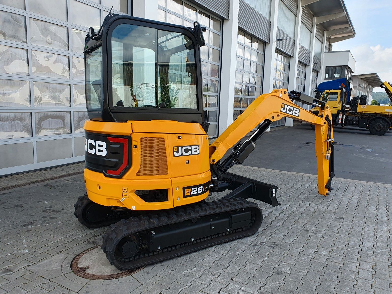Fahrzeugabbildung JCB 26C-1 Pro Cab / Neufahrzeug / Planierschild