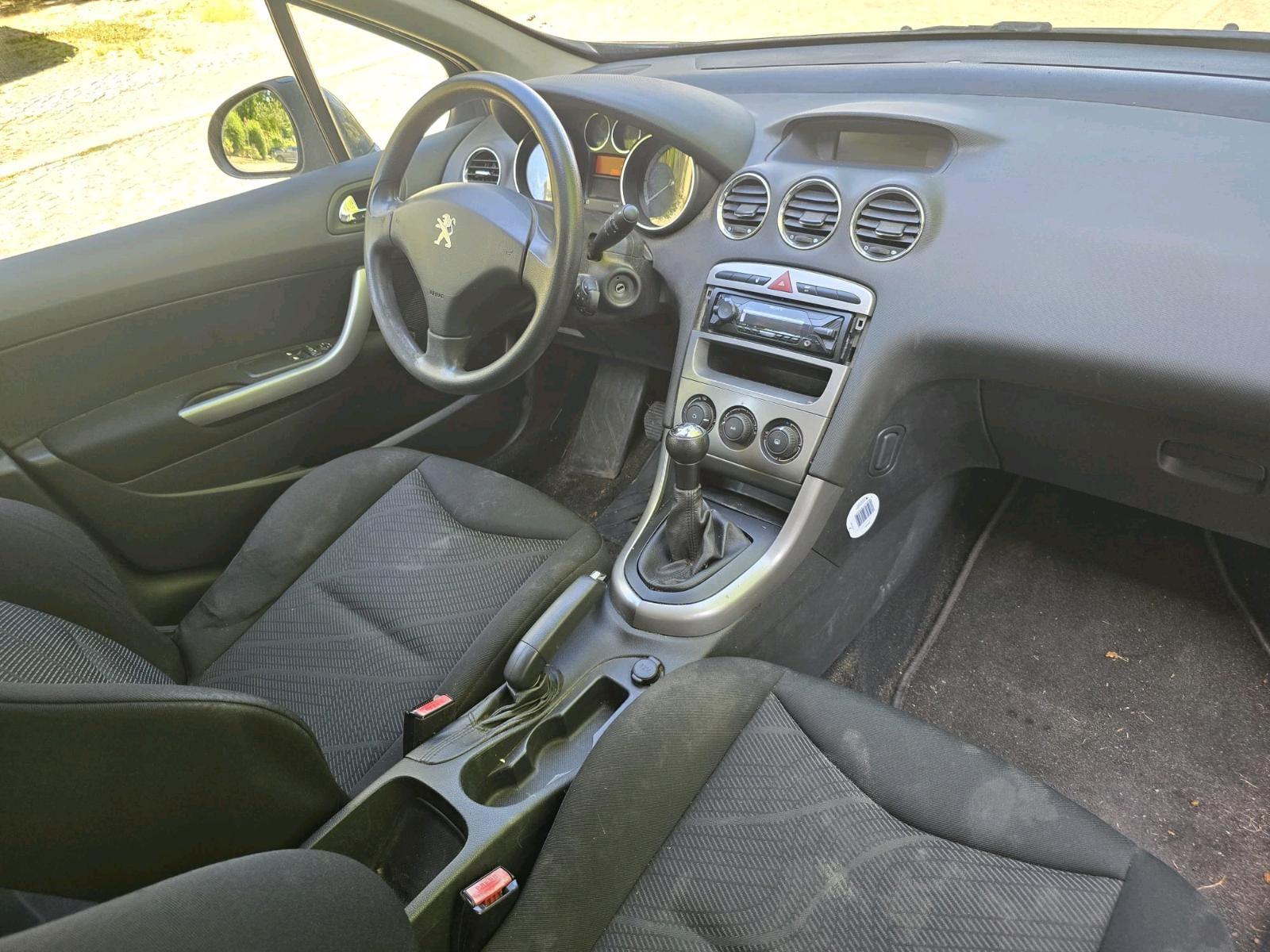 Peugeot 308 2011 — photo 10