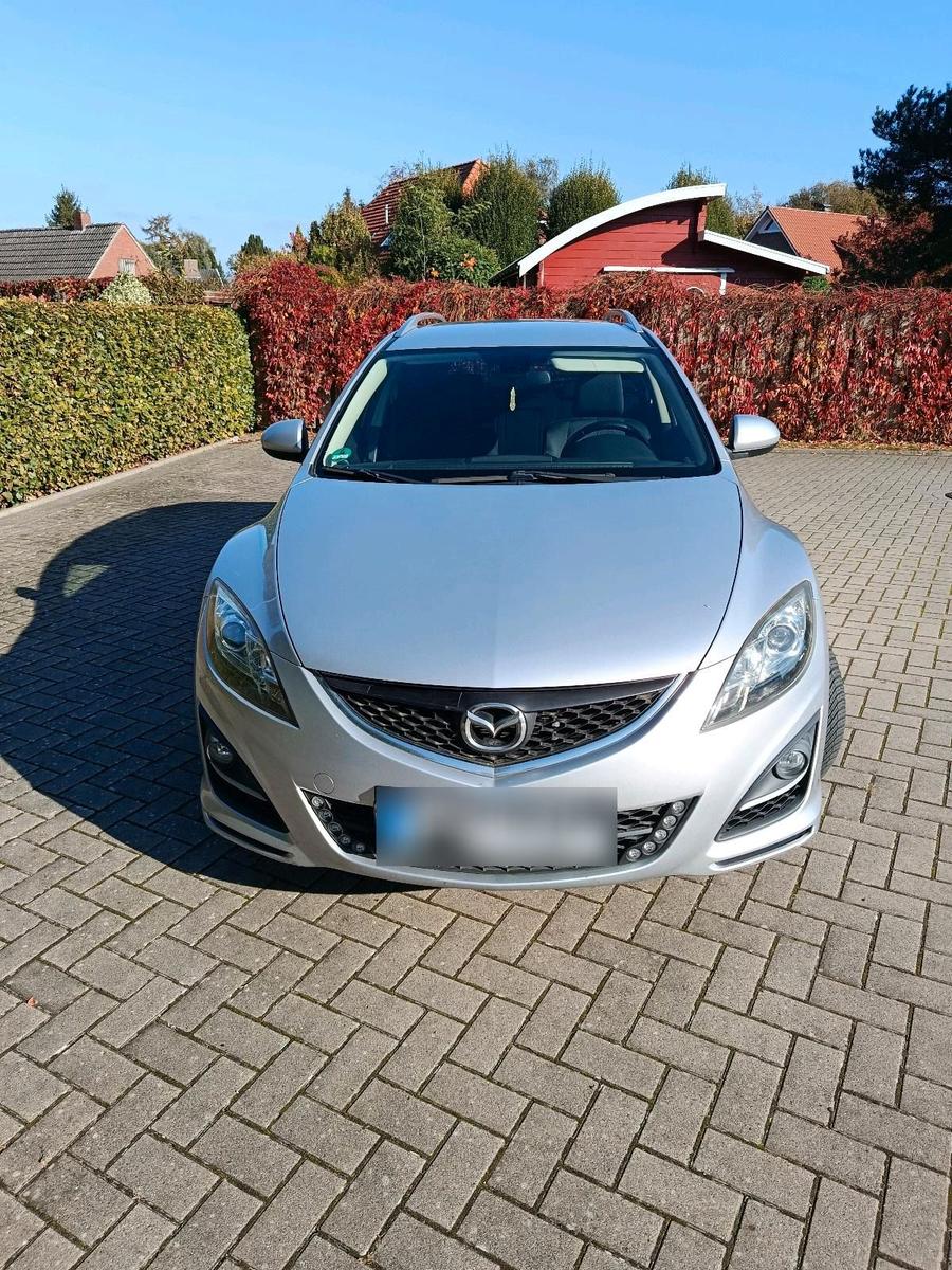 Mazda 2 2011 — вигляд ззаду
