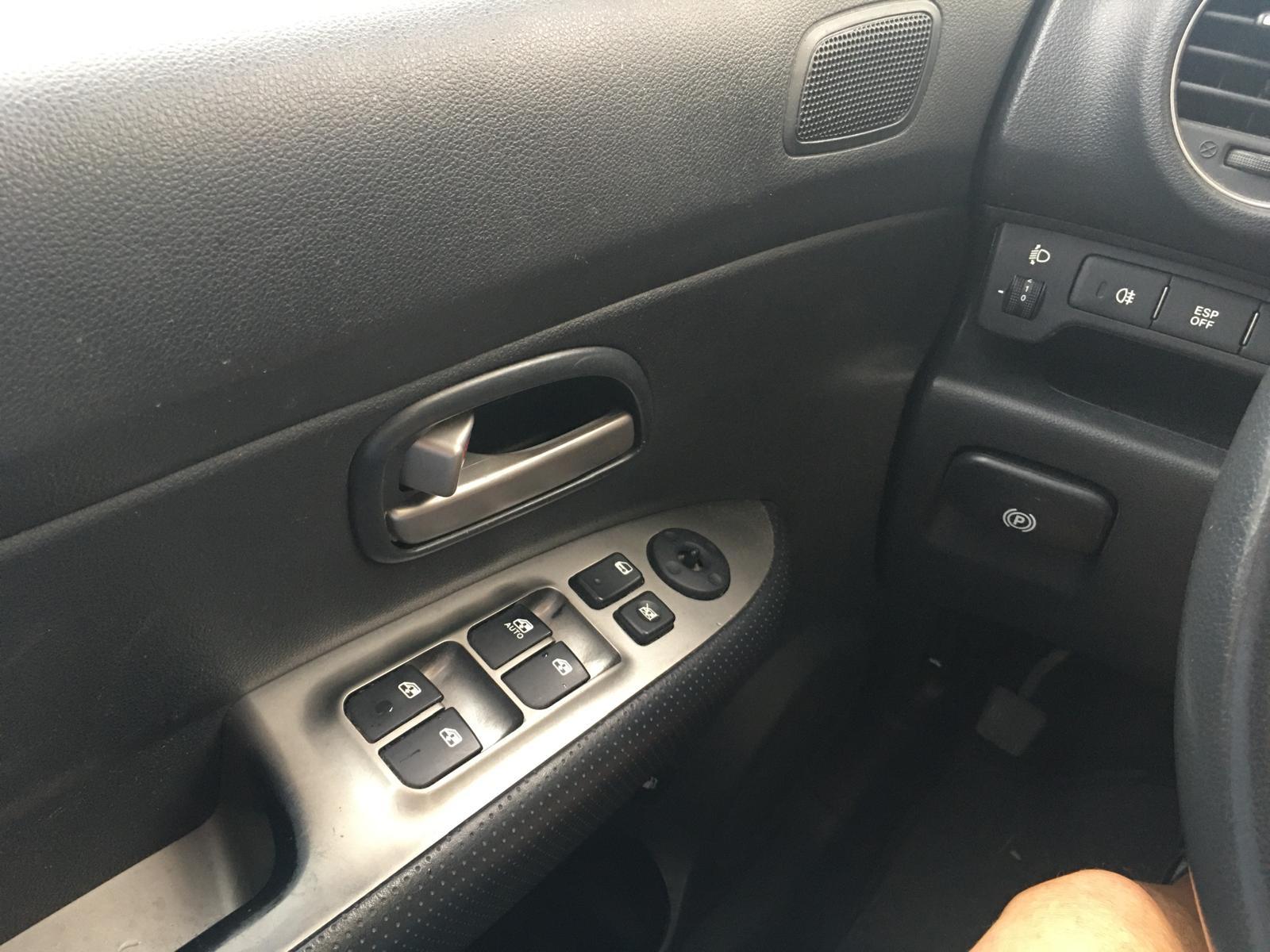 Kia Carens 2009 — photo 8