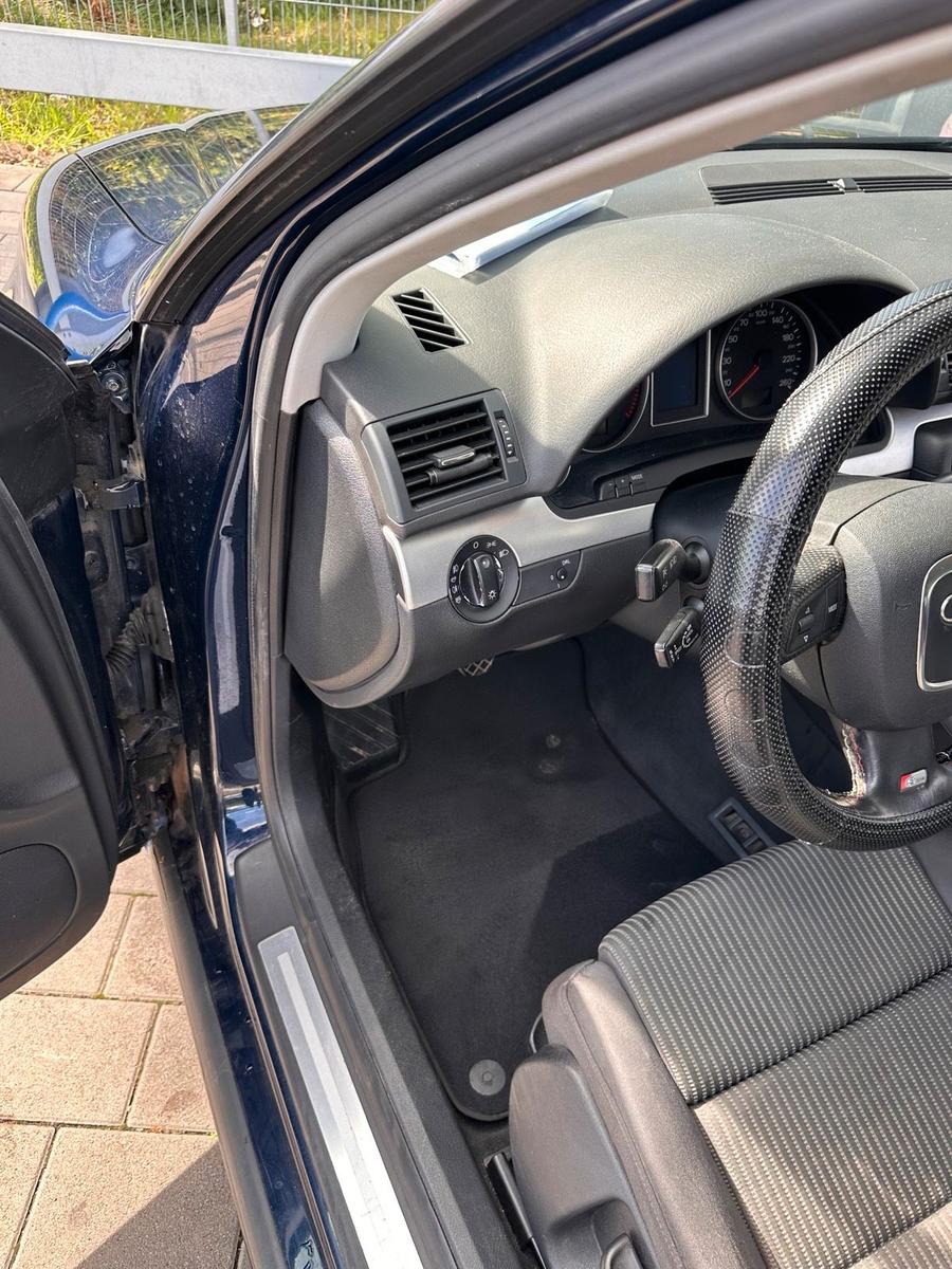 Audi A4 2006 — photo 11