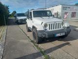 Jeep Wrangler Sahara 2.8 CRD Autom. Sahara - weiße Jeep Wrangler
