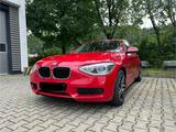 BMW 114i - - rote BMW 114