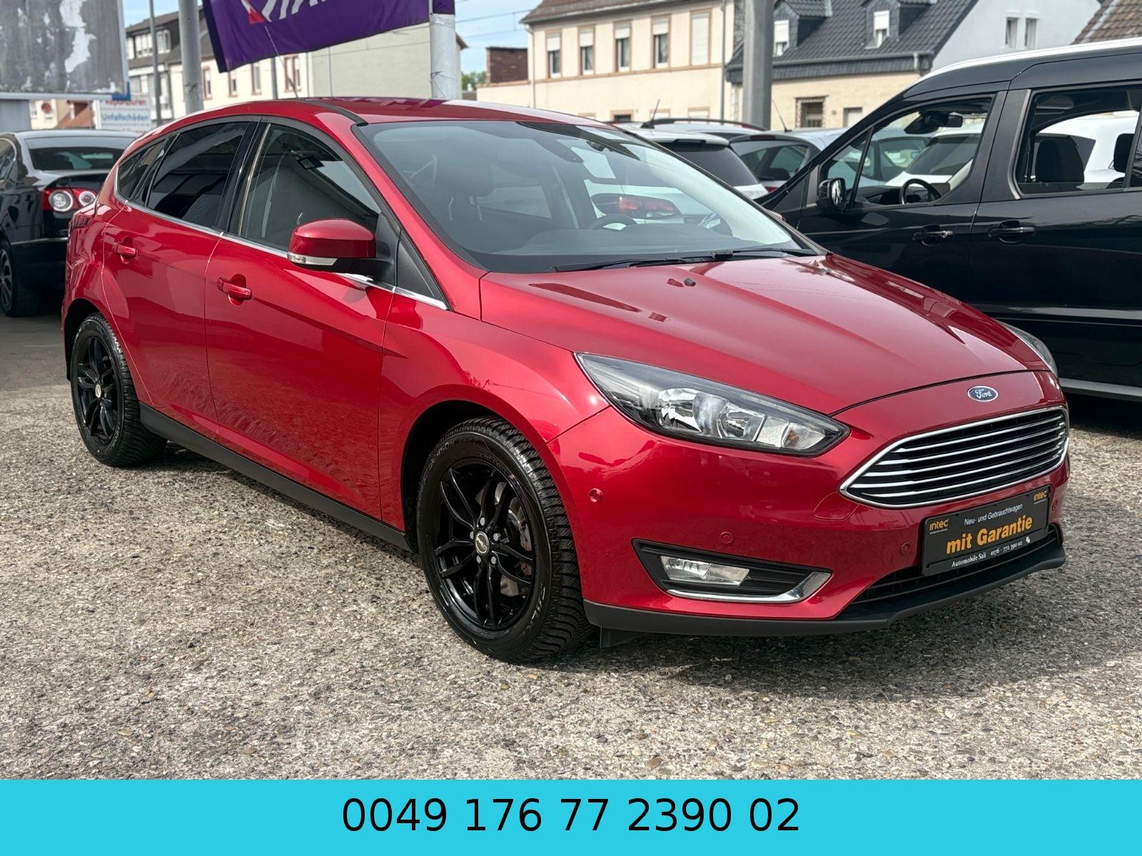 Ford Focus Lim. Titanium*SERVICE NEU*NAVI*KAMERA*SHZ*