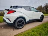 Toyota C-HR 2.0-l-VVTi Hybrid Team Deutschland Team... - gebrauchte Toyota C-HR aus dem Jahr 2021