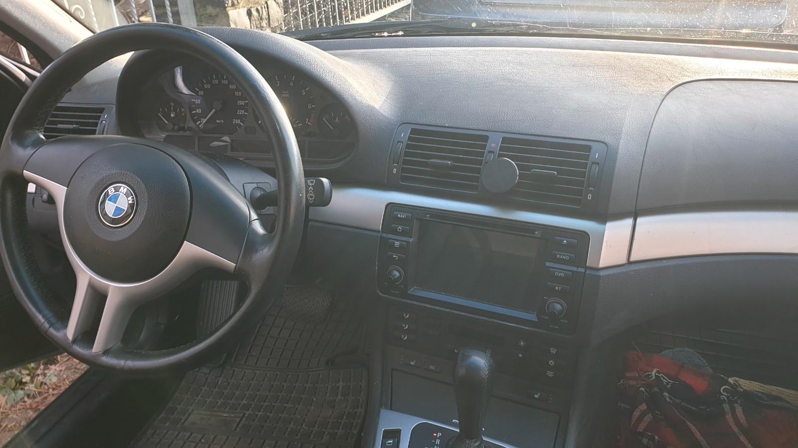 BMW 323 2004 — interior