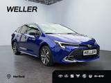 Toyota Corolla TS 2.0 Hybrid Teamplayer +Technik*1,99%* - Toyota Corolla mit Hybrid-Antrieb: Blau, Dachreling