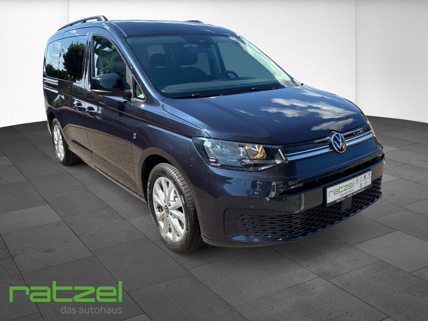 Fahrzeugabbildung Volkswagen Caddy Maxi Life 7-Sitzer 2.0 TDI +PDC+NAVI+Schie