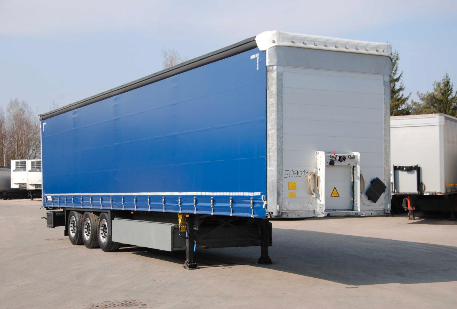 Schmitz Cargobull New tarpaulin, lifting axle