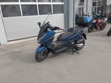 Honda NSS 125 Forza ABS - HONDA ROLLER 125