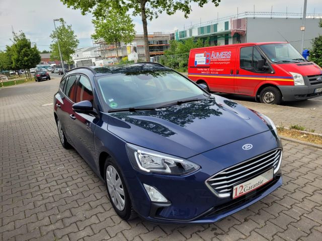 Ford Focus 1.Hand/1 Jahr Garantie/ SHZ /PDC 74 kW ...