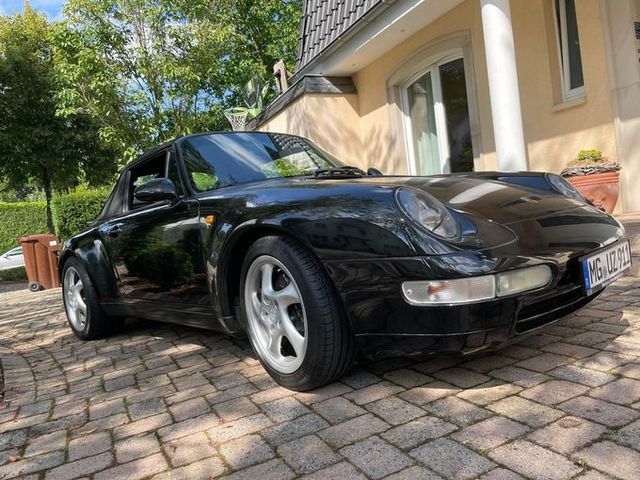 Porsche 993  Cabrio, Tiptronic, Trippel Black, Deutsch