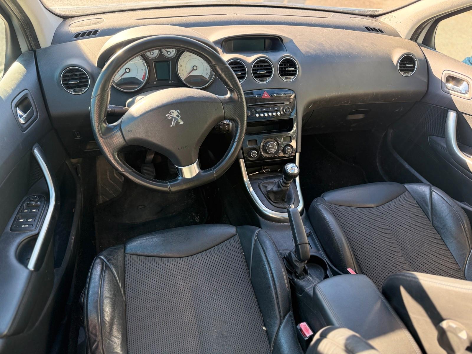 Peugeot 308 2012 — photo 8