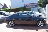 BMW 320i KLIMAAUTOMATIK,NAVI,VOLLLEDER,BI-XENON,PDC - BMW 320 aus 2009: Coupe