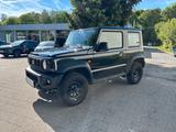 Suzuki Jimny, mit Anhängezugvorrichtung - gebrauchte Suzuki Jimny aus dem Jahr 2023
