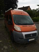 Pössl 2Win - orange Wohnmobil oder -wagen