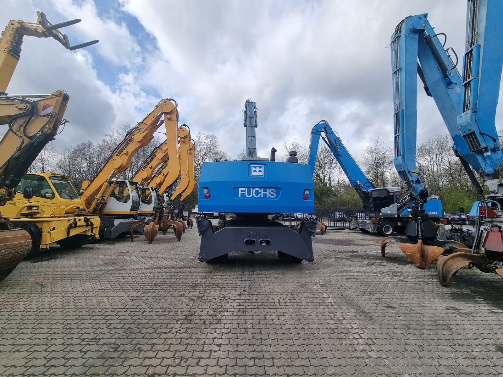 Fahrzeugabbildung Fuchs MHL 360 / AC / Magnetanlage /Polypgreifer /