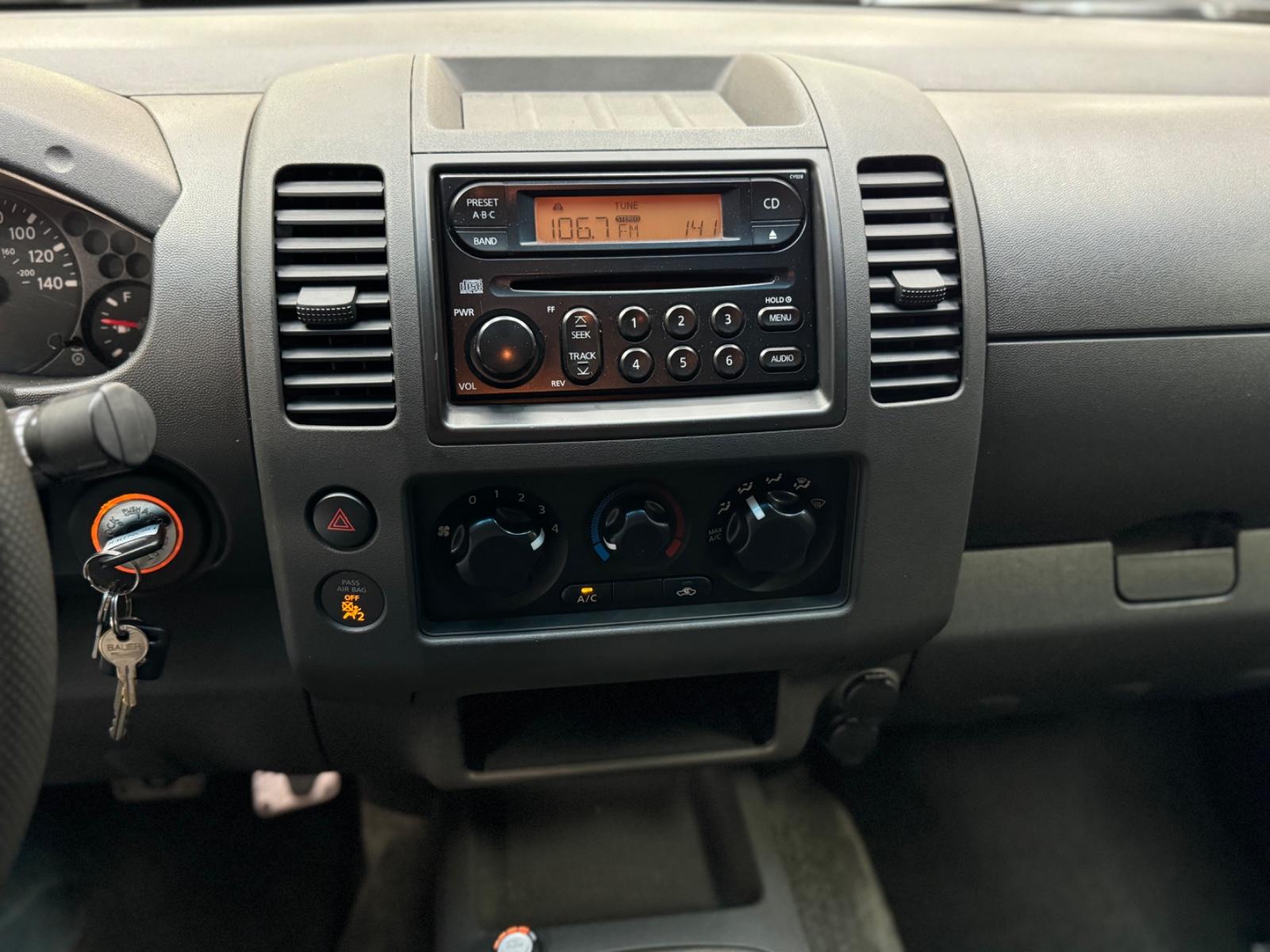 Nissan Frontier 2005 — photo 32